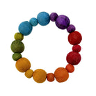 Kantha Prism Poetic Bracelet made of beads that have been sorted and arranged into vibrant, color-blocked sections for an multichromatic rainbow-like display of color.