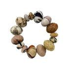 Kantha Desertscape Coterie Bracelet that is made of unique, super large oval-shaped Kantha beads alternate with smaller-sized ovals to create this incredible statement style.