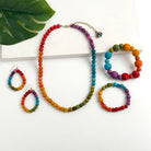 Kantha Prism Collection made of beads that have been sorted and arranged into vibrant, color-blocked sections for an multichromatic rainbow-like display of color.