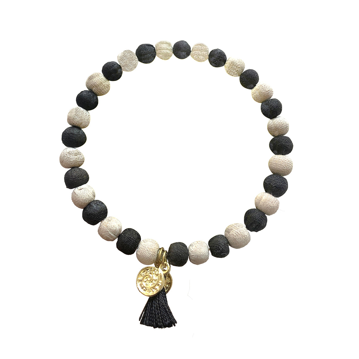 A black and white beaded bracelet against a white background.
