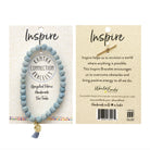 The front and back of a carded beaded bracelet against a white background.