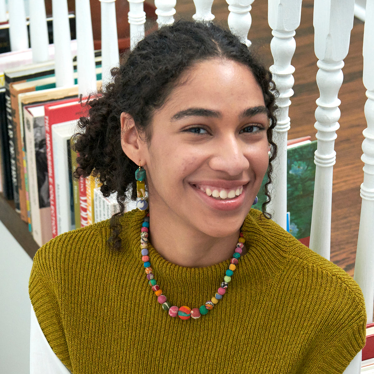 A model wears the Kantha Graduated Choker.