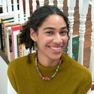 A model wears the Kantha Graduated Choker.