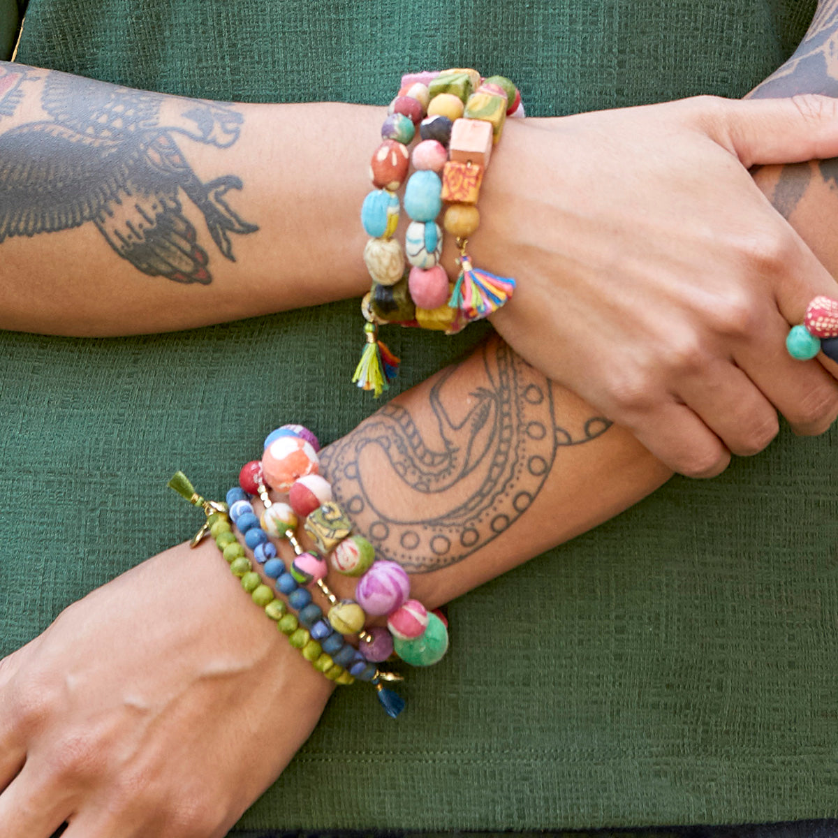 The Kantha Primary Shapes Bracelet adorns a wrist.