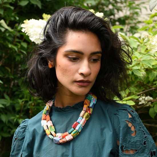 A model wears the Kantha Cubist Necklace.