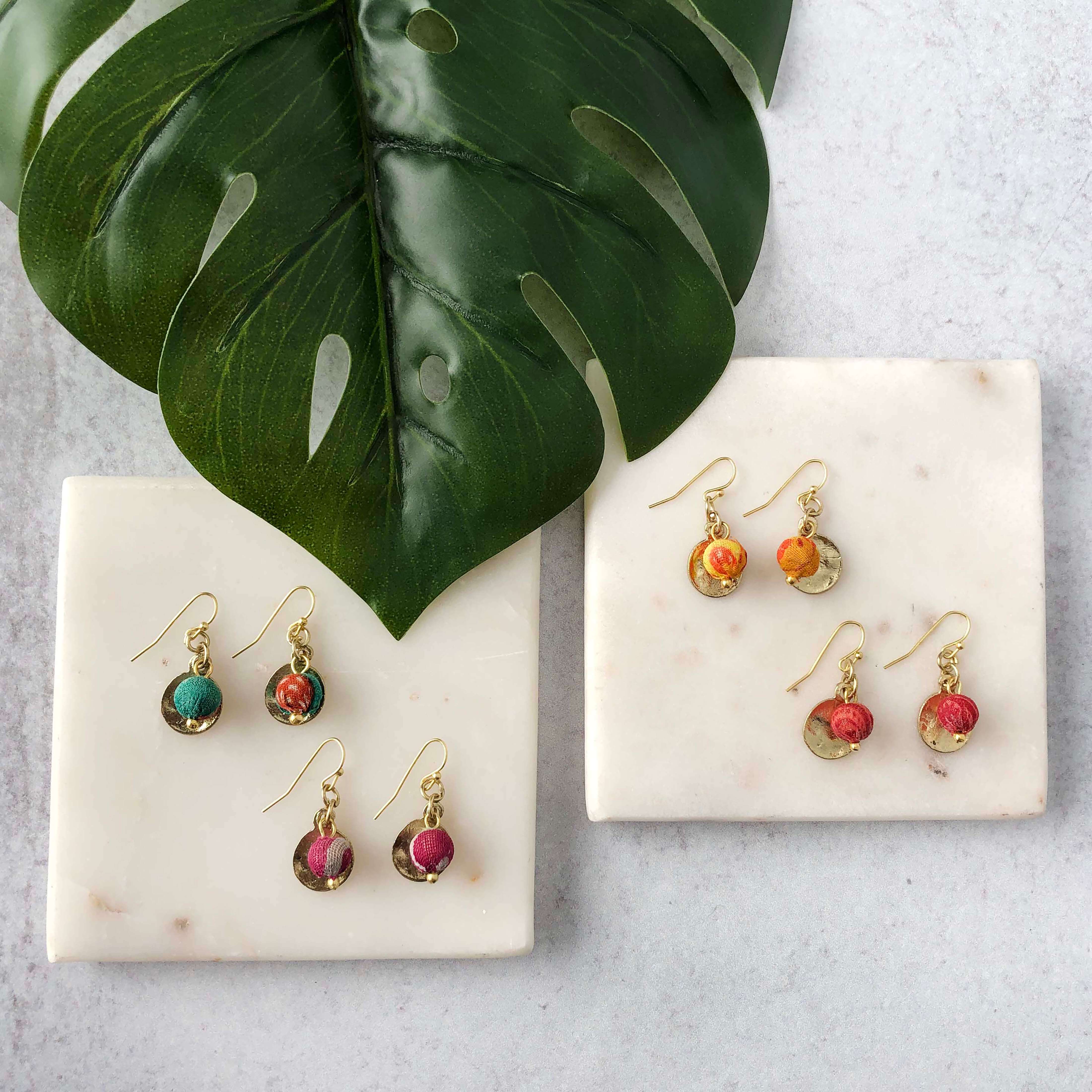 A variety of colors of Kantha Camille Earrings.