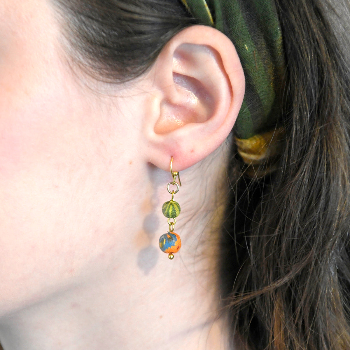 Load image into Gallery viewer, A woman models the Kantha Double Drop Earrings.
