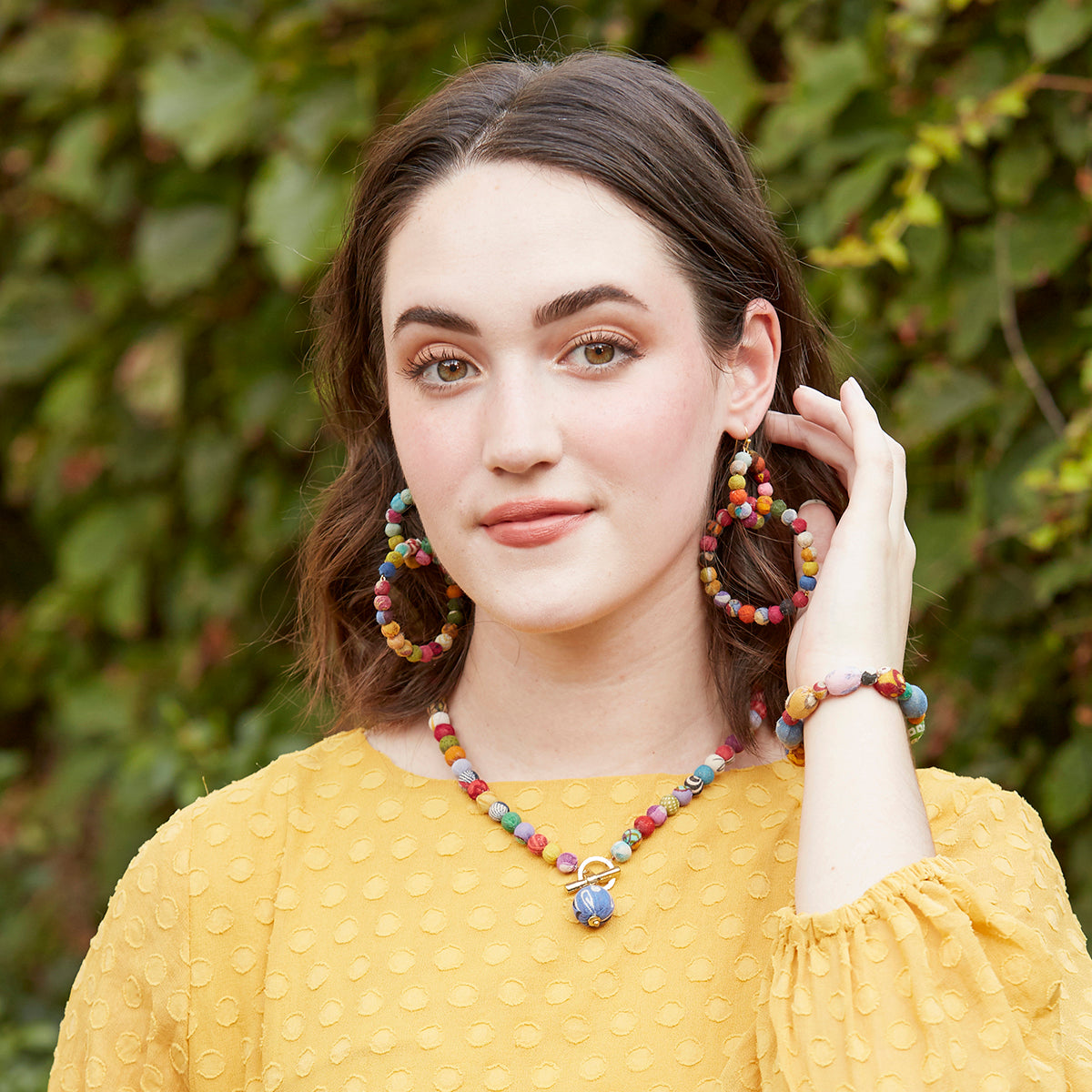 A model poses with the Classic Toggle Necklace.