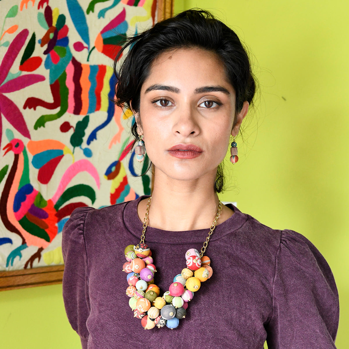 A model wears the Kantha Peony Necklace.