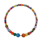 A circle of colorful textile-wrapped beads on a memory wire form this classic choker silhouette.