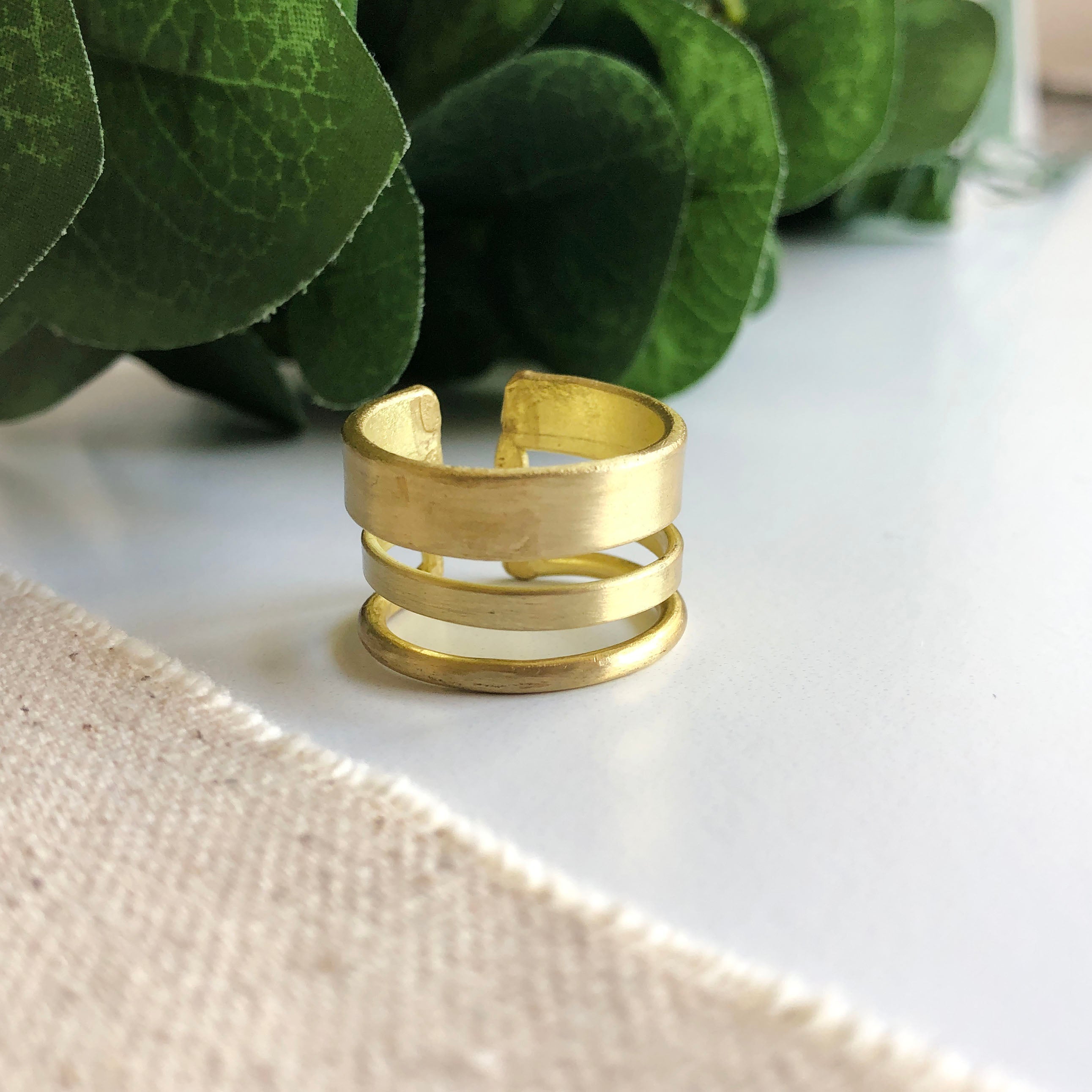Evolving Layers Ring in Gold