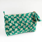 A green Kantha Makeup Bag.