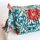 A blue & red Kantha Makeup Bag.