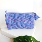 A blue Kantha Makeup Bag.