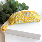 A yellow Kantha Brush Bag