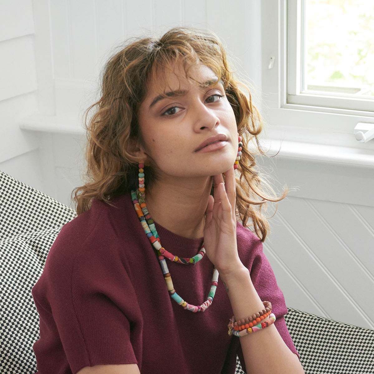 A model wears the Kantha Dot Dash Necklace.